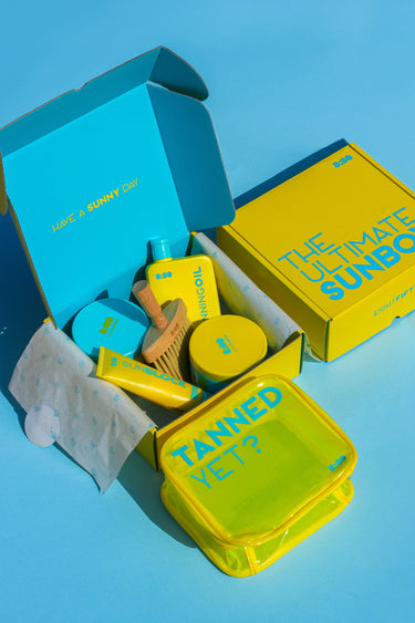 The Ultimate Sun Box open with the Tanned Yet bag