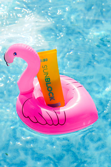 8:50 Sunblock in a flamingo float in the pool