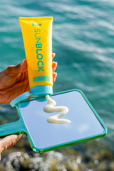 8:50 Sunblock cream on a mirror by the sea